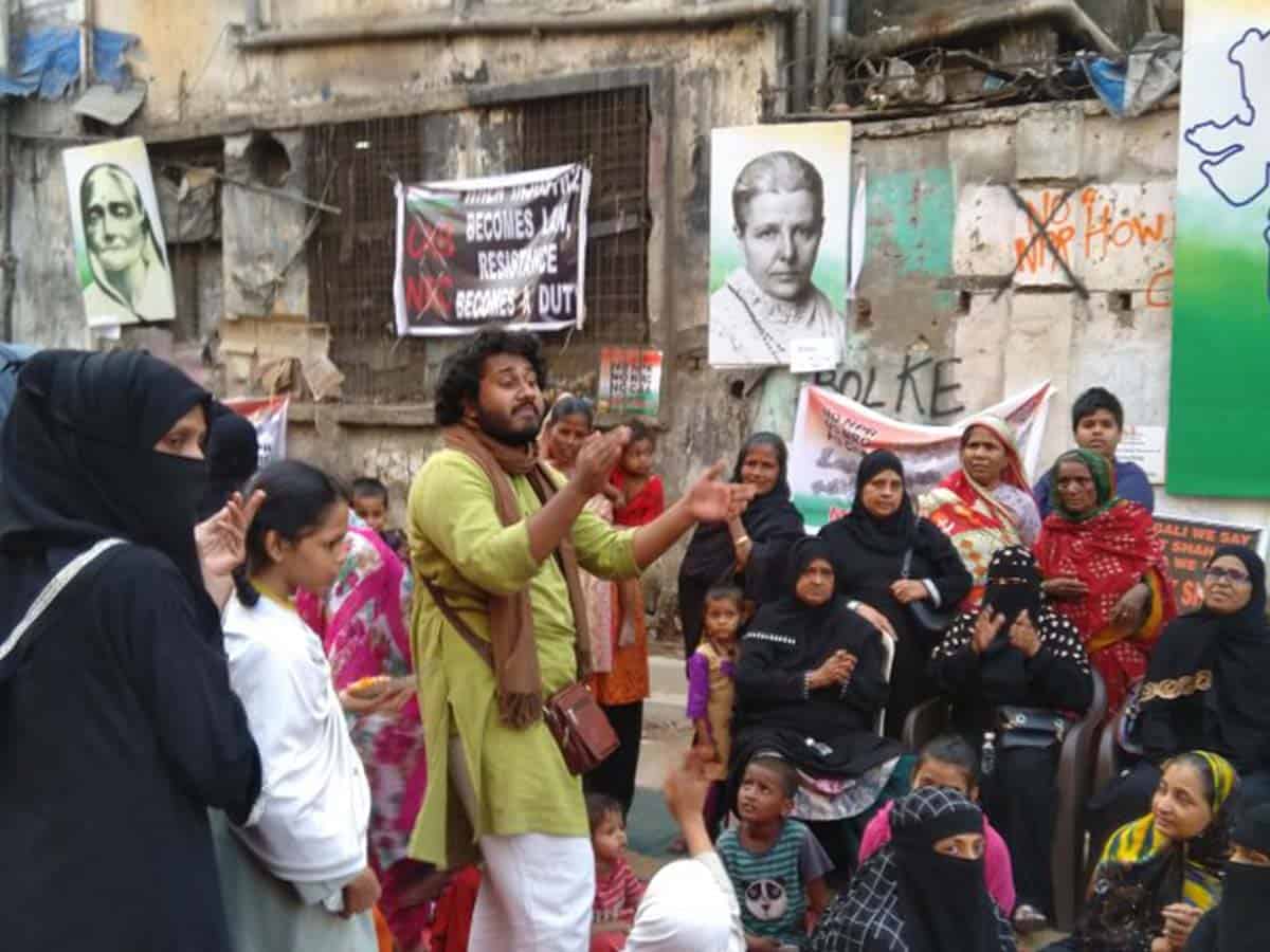 Bappadittoh in his element leading the chants while a small child yells "Jai Bhim" from behind me