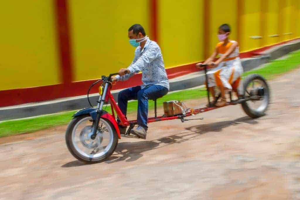 School drop-out builds ‘social distancing’ motorbike