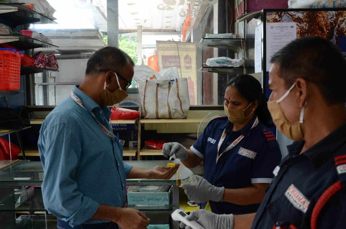 While entering the shopping mall customers are being sanitised in Hyderabad. Photo: Mohammed Hussain
