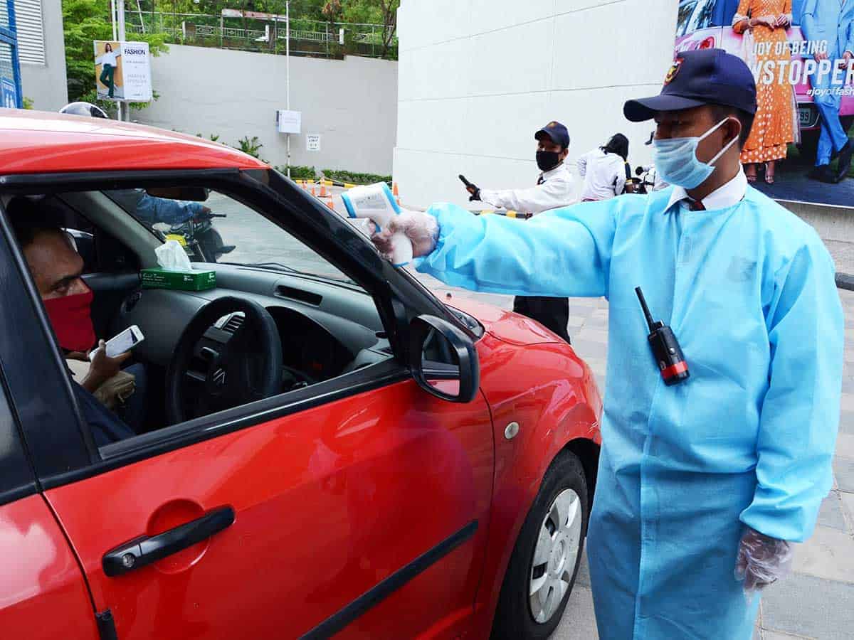 Masks and temperature checks as malls open doors in Hyderabad. Photo: Mohammed Hussain