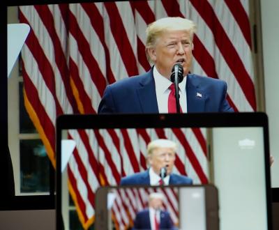 Trump drops election delay idea, targets postal voting (2nd Ld)