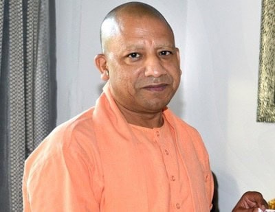 Yogi meets kin of Bikru massacre victims