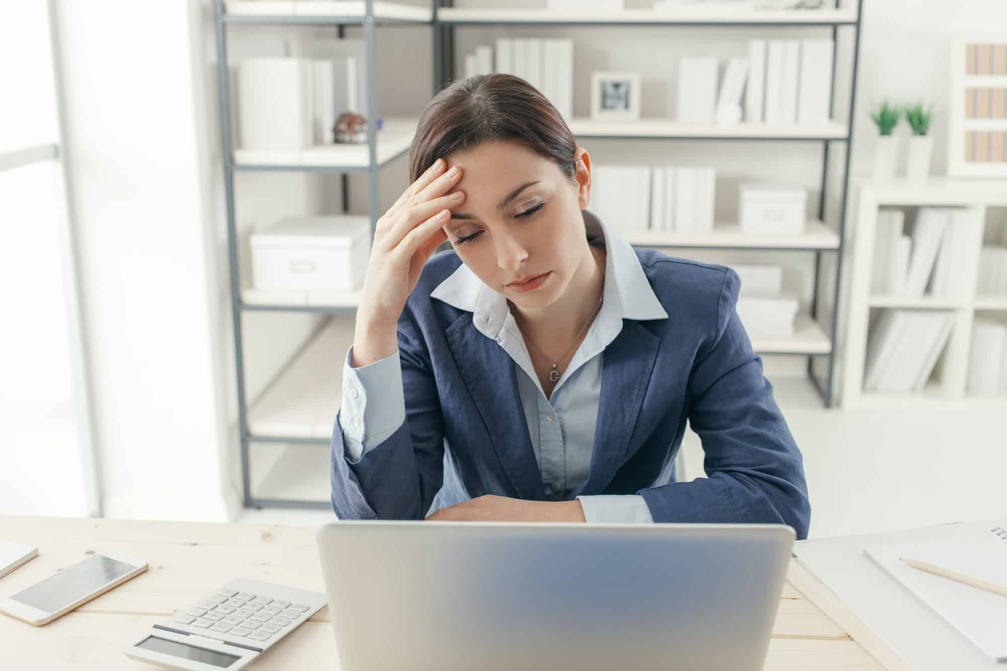 Exhausted businesswoman in the office