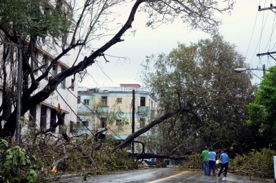 Cuban firefighters battle blazes after storm lashes island
