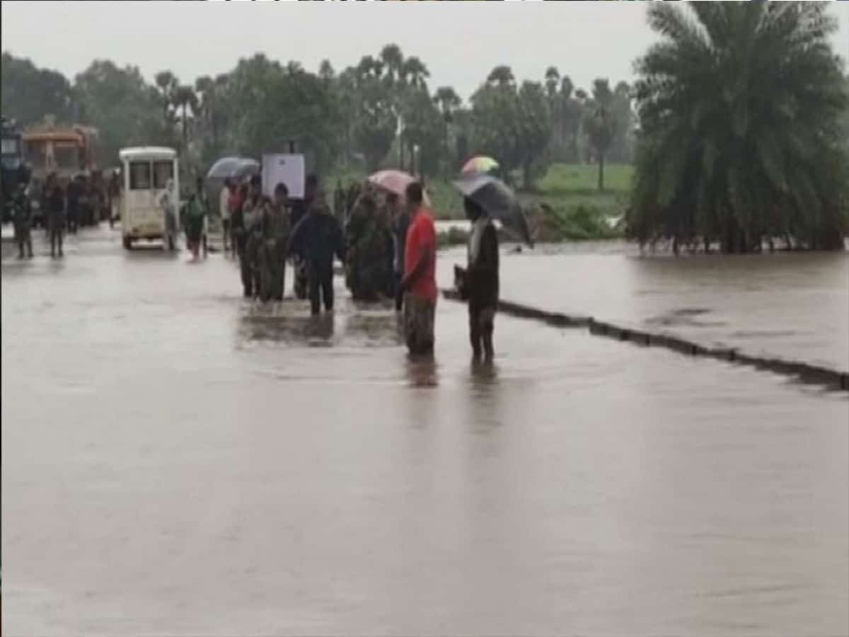 Chhattisgarh: CRPF personnel carry DRG jawan's mortal remains on foot amid rising water