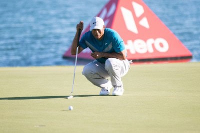 Johnson leads packed leaderboard at PGA C'ship, Woods at T59th