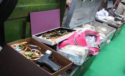 Luxury vehicles, gold, horses seized from Andhra official