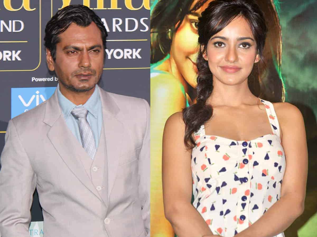 Nawazuddin Siddiqui, Neha Sharma (Image courtesy: Twitter) Nawazuddin Siddiqui, Neha Sharma to star in rom-com 'Jogira Sara Ra Ra'