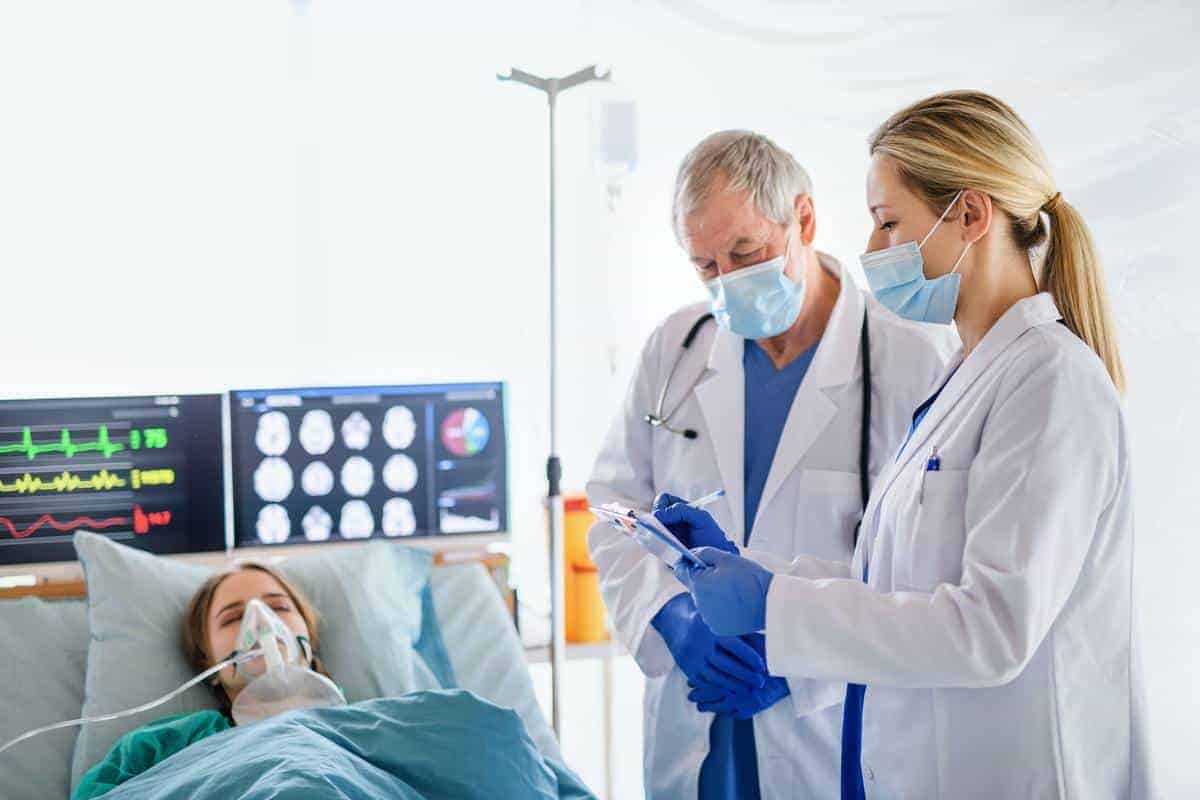 Doctors and infected patient in quarantine in hospital, coronavirus concept