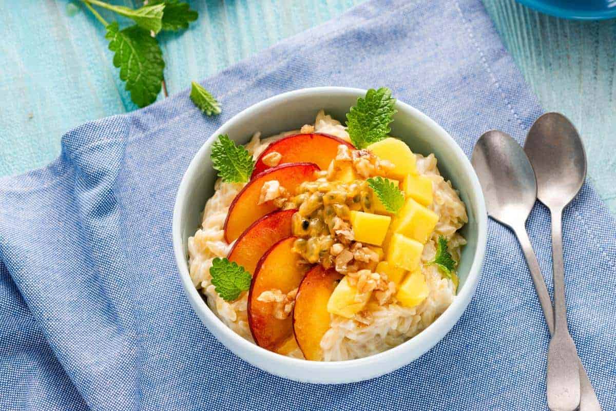 Sweet and Healthy Porridge with Fresh Fruits. Diet Breafast Idea