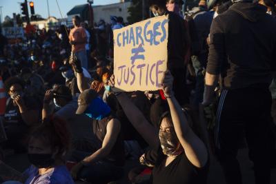 2 US policemen shot during protest, suspect held