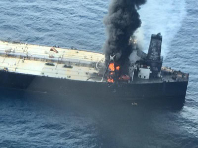 Oil tanker blaze under control, vessel towed to stop drift into shallows (Roundup)