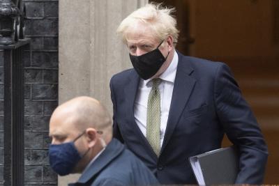 Johnson defends Covid-19 curbs as 'right, responsible thing'