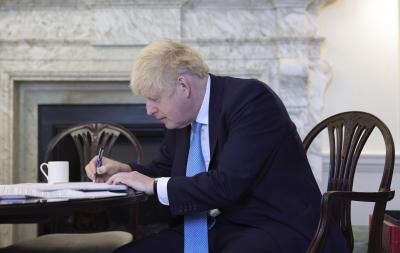 British PM announces 'tougher' tiered system of covid restrictions