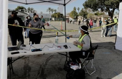 California reports record spike in daily Covid deaths