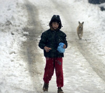 Snow in valley, rain in Jammu