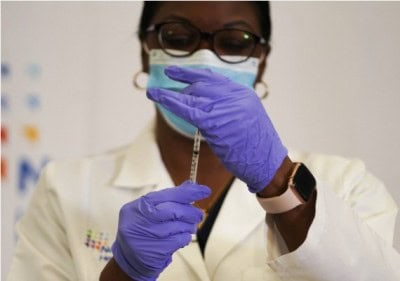 US vaccination drive reveals racial disparity: media