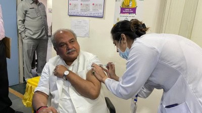 Agri Minister takes 1st Covid vax jab at RML