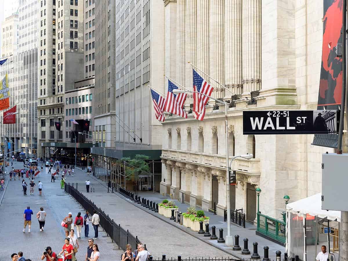 Asian markets lower after Wall Street recovers to new high