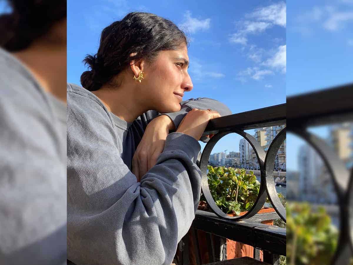 Kubbra Sait shares a cool picture against a wall mural