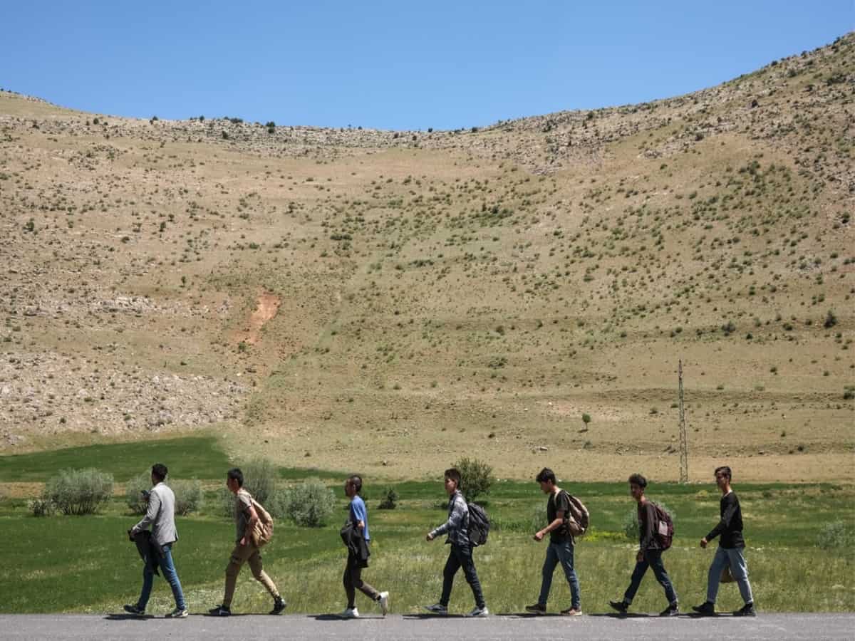 Over a million Afghans flee to Iran as economy collapses