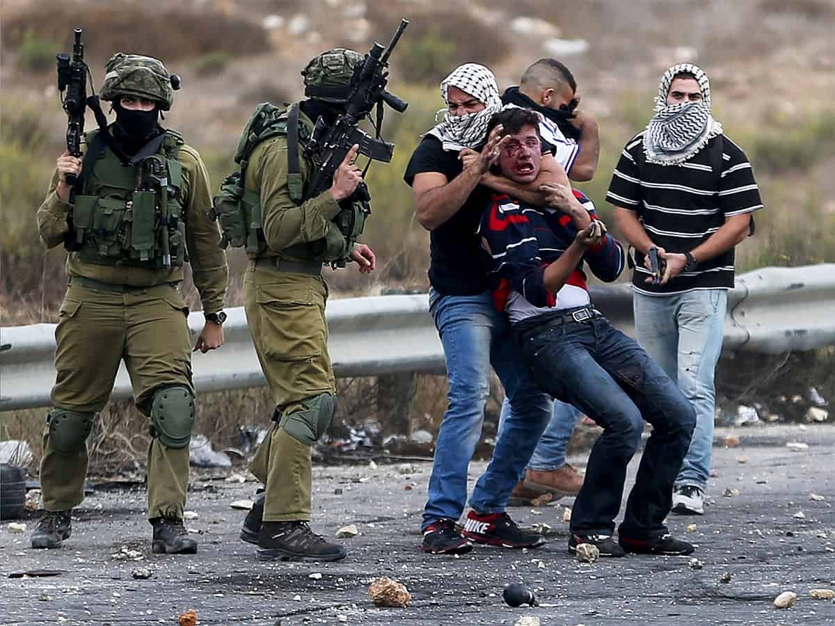 8 Palestinians injured, 14 arrested in Israeli raid in West Bank