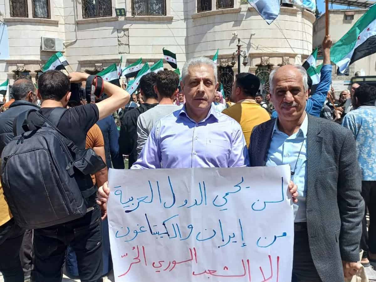 Arab Summit: Syrians protest Assad's participation; Qatar Emir skips Assad speech